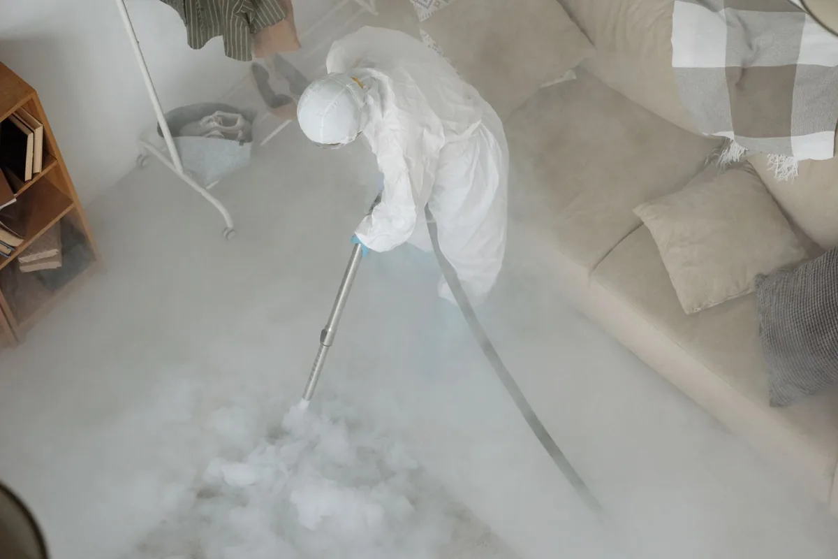 Biohazard cleanup technician in protective equipment, Mount Kisco, NY